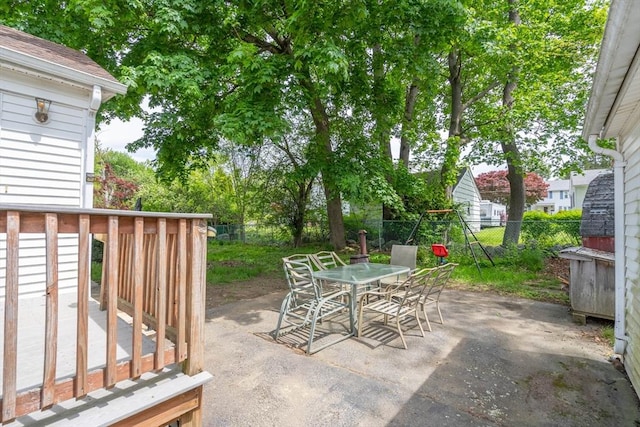 7 Prospect Ave, Dudley, MA 01571 - view of patio with outdoor dining area, a fenced backyard, and a deck