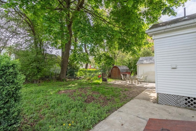 7 Prospect Ave, Dudley, MA 01571 - view of yard with a storage unit, an outbuilding, fence, and a patio area