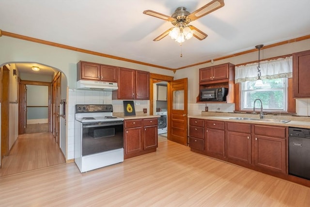7 Prospect Ave, Dudley, MA 01571 - kitchen featuring black appliances, under cabinet range hood, a sink, washer / clothes dryer, and light wood-style floors