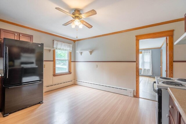 7 Prospect Ave, Dudley, MA 01571 - kitchen featuring freestanding refrigerator, white electric stove, a wainscoted wall, ceiling fan, and light wood-style floors
