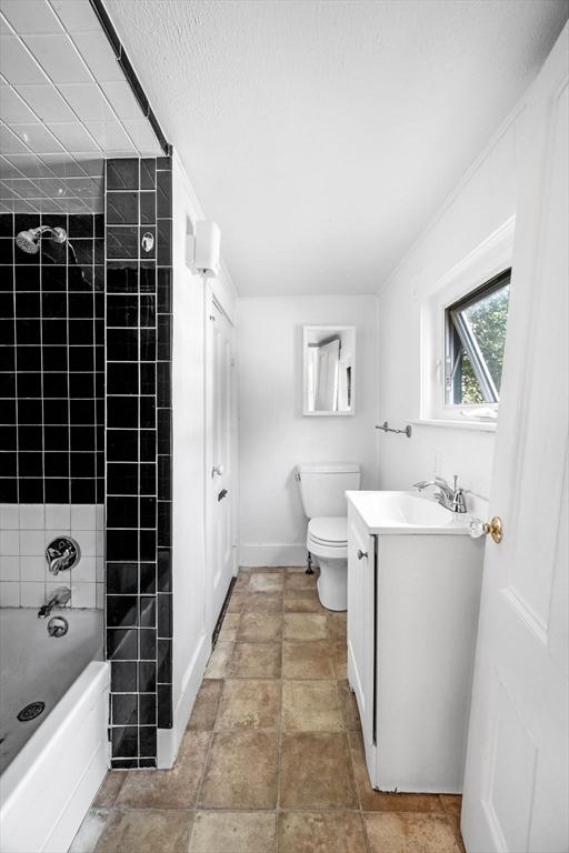 343 Cabot St, Beverly, MA 01915 - bathroom featuring vanity and bathing tub / shower combination