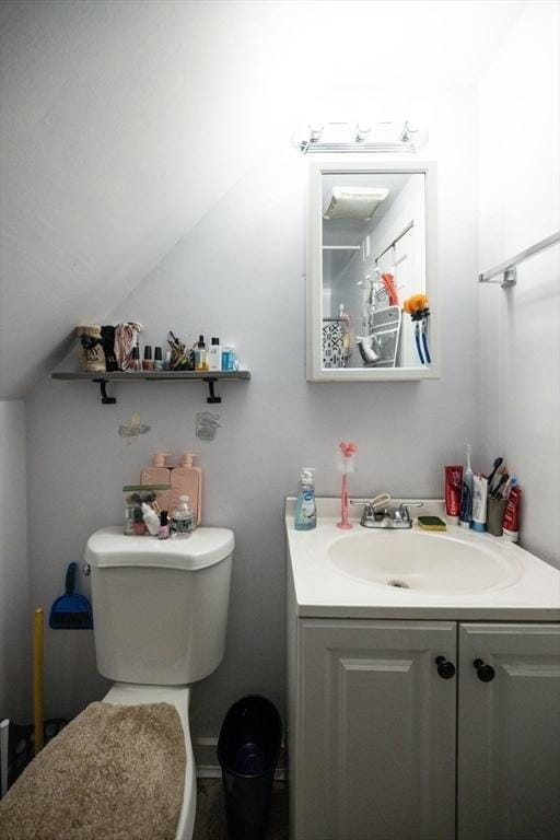 343 Cabot St, Beverly, MA 01915 - bathroom featuring vanity and vaulted ceiling