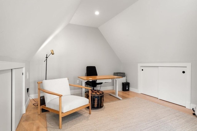 office with vaulted ceiling, light wood-style floors, baseboards, and recessed lighting