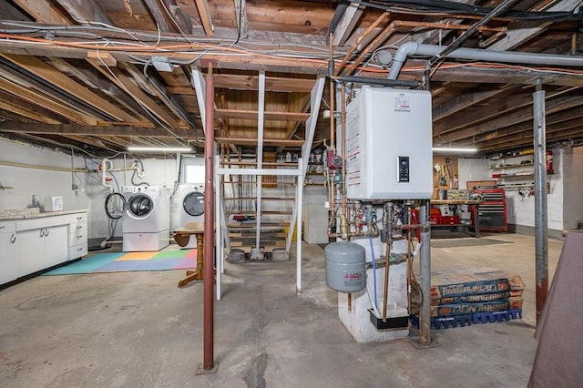 unfinished basement with washing machine and clothes dryer and a workshop area