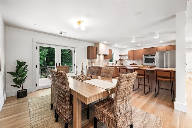 1 Archer St, Swampscott, MA 01907 - dining space with light wood-style flooring and recessed lighting
