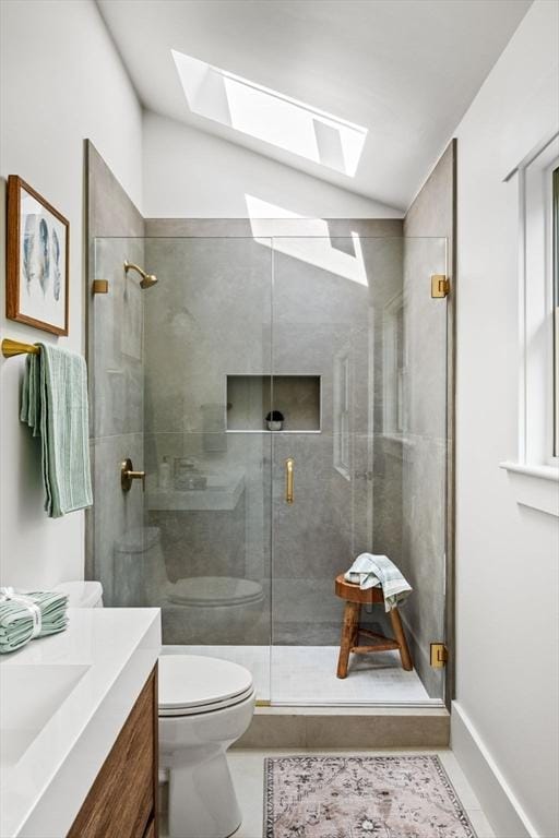 1 Archer St, Swampscott, MA 01907 - full bathroom featuring a skylight, vanity, and a stall shower