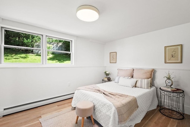 1 Archer St, Swampscott, MA 01907 - bedroom with baseboard heating and wood finished floors