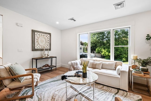1 Archer St, Swampscott, MA 01907 - living area with wood finished floors and recessed lighting