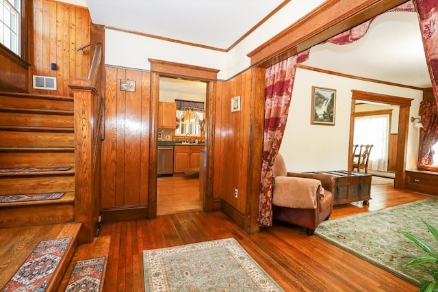 88 Biltmore St, Springfield, MA 01108 - hallway featuring dark wood-style flooring, plenty of natural light, and ornamental molding