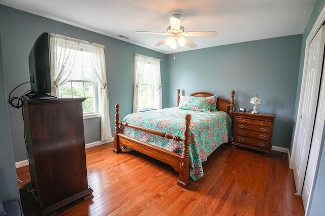 9 Gideon Ln, Shirley, MA 01464 - bedroom with a closet, wood finished floors, baseboards, and ceiling fan