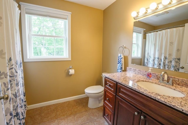 9 Gideon Ln, Shirley, MA 01464 - full bath featuring healthy amount of natural light, toilet, vanity, and baseboards