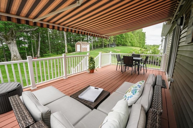 9 Gideon Ln, Shirley, MA 01464 - wooden terrace with outdoor dining area, a lawn, an outdoor living space, and central AC