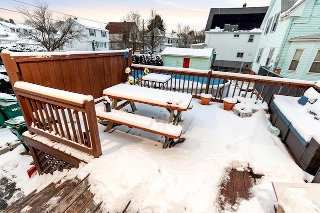 view of snow covered deck