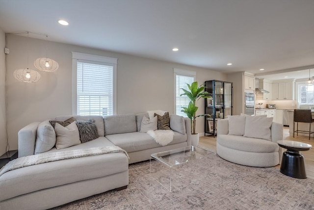 41 Pleasant St, Holliston, MA 01746 - living room featuring light wood finished floors and recessed lighting