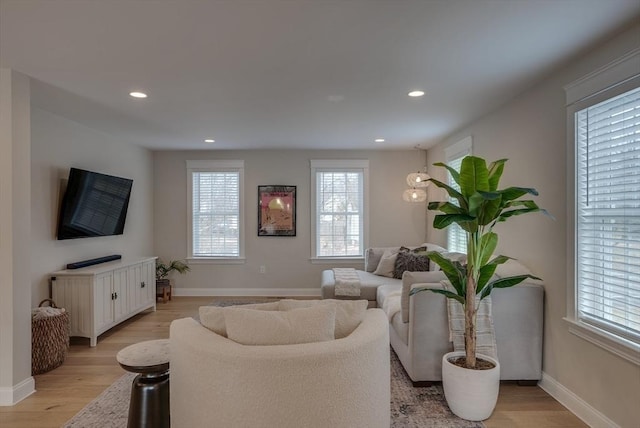 41 Pleasant St, Holliston, MA 01746 - living area featuring light wood-style floors, baseboards, and recessed lighting
