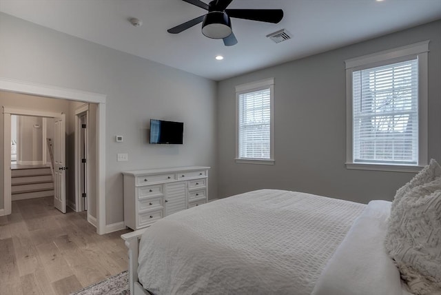 41 Pleasant St, Holliston, MA 01746 - bedroom featuring light wood finished floors, baseboards, recessed lighting, a ceiling fan, and ensuite bath