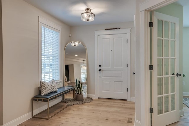 41 Pleasant St, Holliston, MA 01746 - foyer featuring light wood-style flooring and baseboards