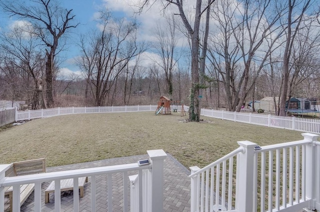 41 Pleasant St, Holliston, MA 01746 - view of yard featuring a trampoline, a playground, and a patio area