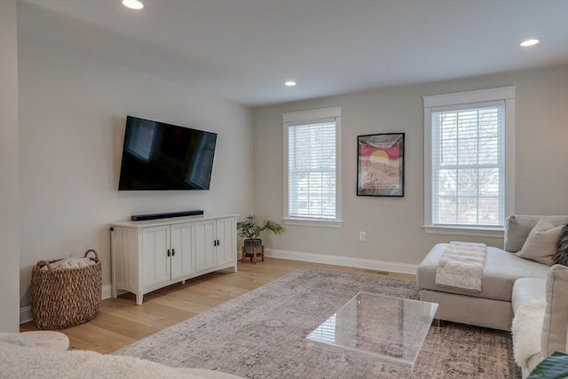 41 Pleasant St, Holliston, MA 01746 - living room with light wood-style flooring, healthy amount of natural light, baseboards, and recessed lighting