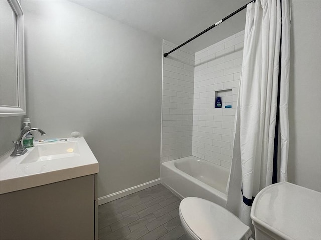 full bathroom with shower / tub combo with curtain, vanity, wood-type flooring, and toilet