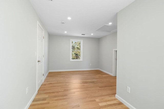 unfurnished room with light hardwood / wood-style flooring