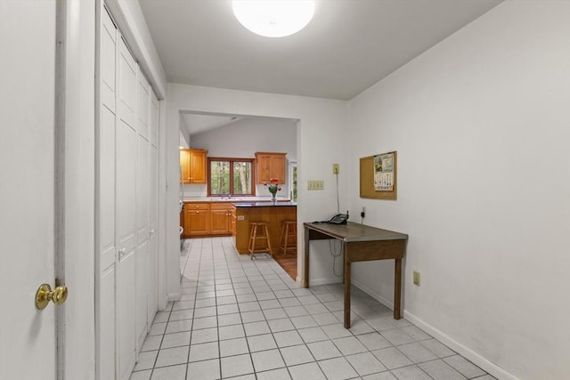 9 Flagg Rd, Acton, MA 01720 - hall featuring vaulted ceiling, light tile patterned flooring, and baseboards