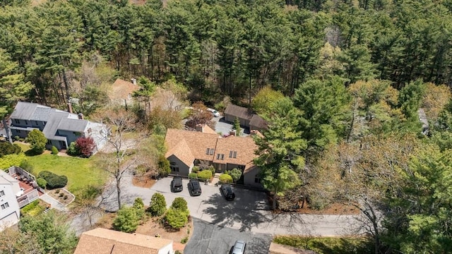 bird's eye view featuring a forest view