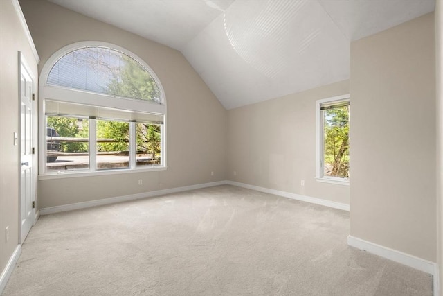 bonus room featuring vaulted ceiling, carpet floors, and baseboards