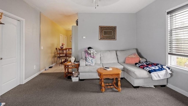 160-162 Rockland St, Fall River, MA 02724 - living area with carpet floors, a ceiling fan, and baseboards