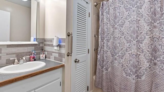 160-162 Rockland St, Fall River, MA 02724 - full bath featuring a closet, vanity, tasteful backsplash, and a shower with curtain