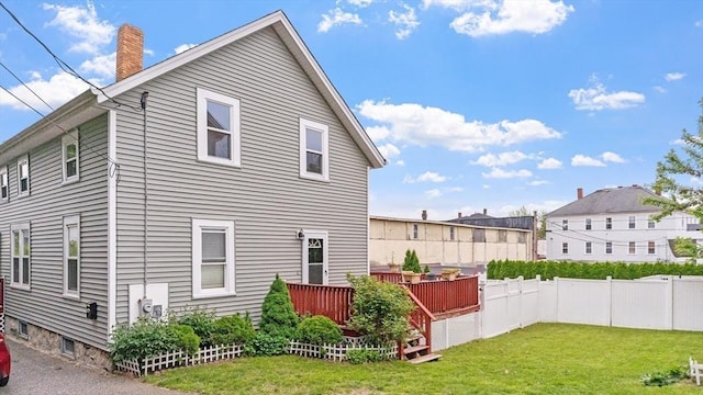 160-162 Rockland St, Fall River, MA 02724 - back of house with a chimney and a wooden deck