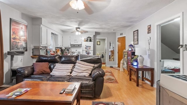160-162 Rockland St, Fall River, MA 02724 - living area with ceiling fan and light wood-style floors