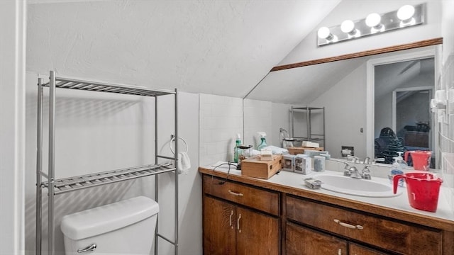160-162 Rockland St, Fall River, MA 02724 - ensuite bathroom with lofted ceiling, toilet, and vanity