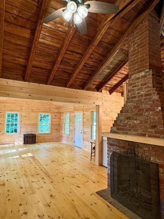 14 Wood Way, Northfield, MA 01360 - unfurnished living room with wood ceiling, hardwood / wood-style floors, a ceiling fan, wooden walls, and a brick fireplace