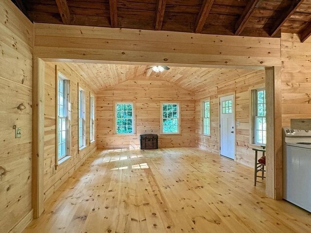 14 Wood Way, Northfield, MA 01360 - unfurnished living room with wooden walls, light wood-type flooring, wooden ceiling, and washer / dryer