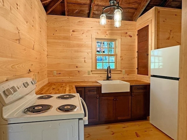 14 Wood Way, Northfield, MA 01360 - kitchen featuring white appliances, a sink, butcher block countertops, vaulted ceiling, and wooden ceiling