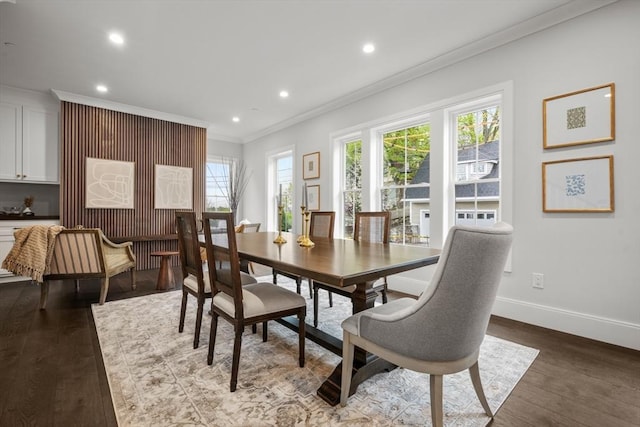 dining space featuring recessed lighting, ornamental molding, wood finished floors, and a wealth of natural light