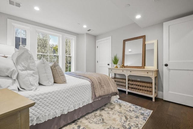 bedroom featuring visible vents, recessed lighting, and wood finished floors