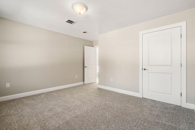 unfurnished room featuring carpet floors