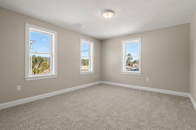 view of carpeted spare room