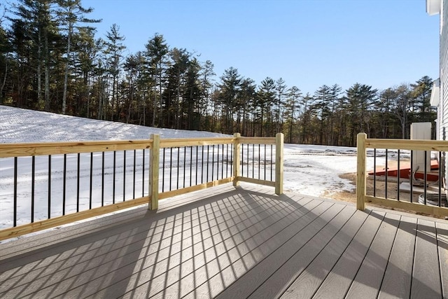 view of snow covered deck