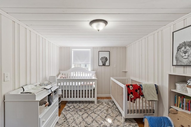 bedroom with wood finished floors
