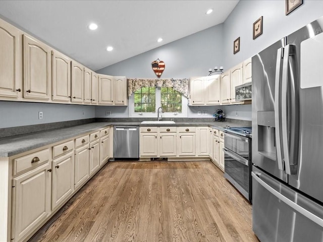 235 Stone School Rd, Sutton, MA 01590 - kitchen with appliances with stainless steel finishes, a sink, lofted ceiling, dark wood-style flooring, and recessed lighting