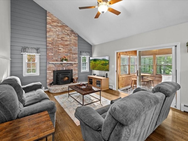 235 Stone School Rd, Sutton, MA 01590 - living area featuring ceiling fan, high vaulted ceiling, wood finished floors, wooden walls, and baseboard heating