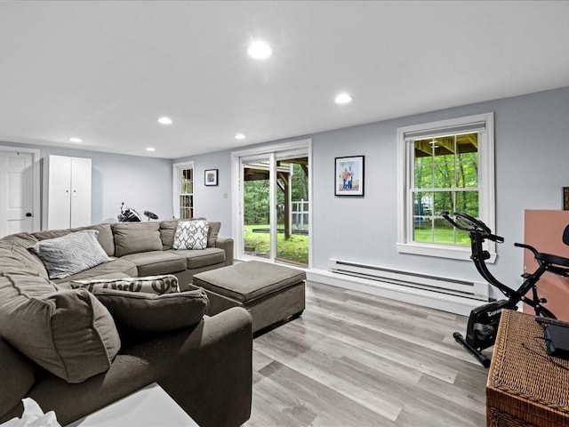 235 Stone School Rd, Sutton, MA 01590 - living area featuring baseboard heating, recessed lighting, light wood-type flooring, and plenty of natural light