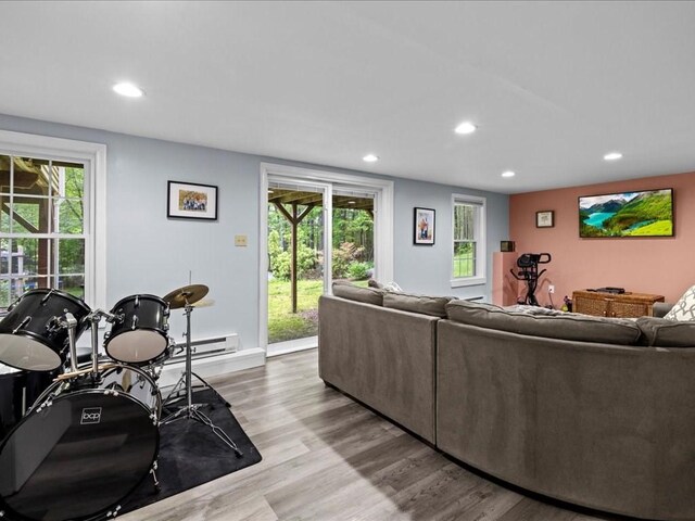 235 Stone School Rd, Sutton, MA 01590 - living area with recessed lighting, wood finished floors, baseboards, and baseboard heating