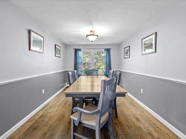 235 Stone School Rd, Sutton, MA 01590 - dining space with wood finished floors and baseboards