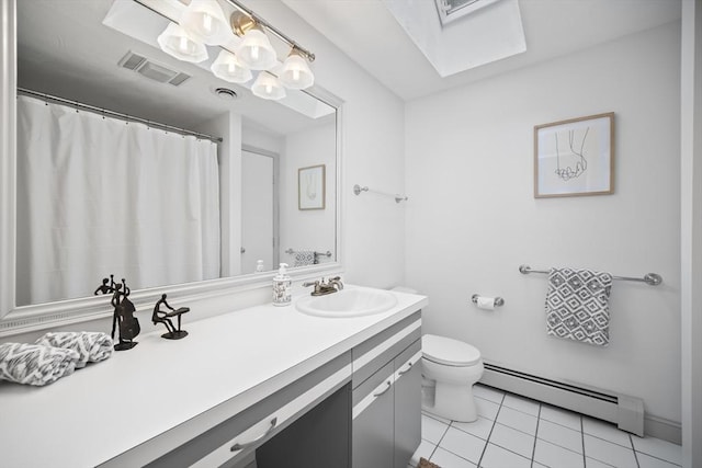 24 Fairhaven Cir, Sudbury, MA 01776 - bathroom with a baseboard radiator, a skylight, vanity, and tile patterned floors