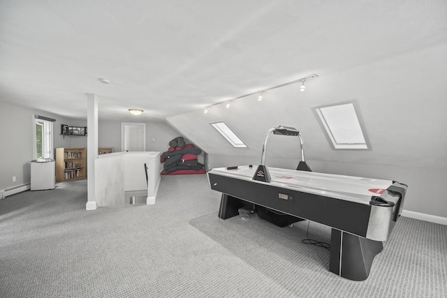 24 Fairhaven Cir, Sudbury, MA 01776 - playroom featuring rail lighting, a skylight, vaulted ceiling, carpet floors, and baseboard heating