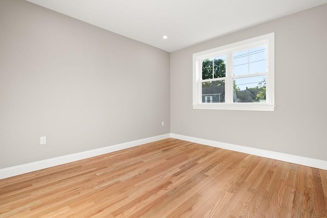 19 Vine Unit 4, Weymouth, MA 02188 - spare room with baseboards and light wood-style flooring